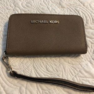Gently used authentic Michael Kors Wristlet